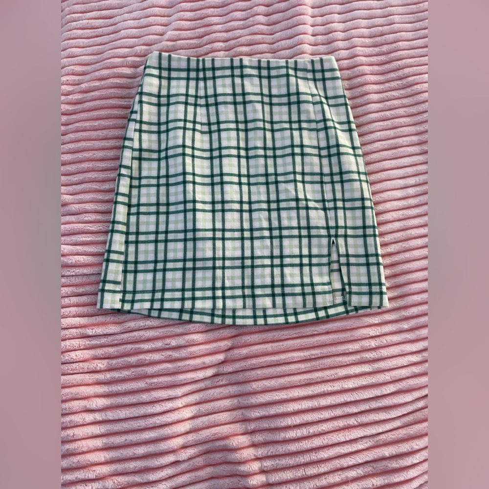 Green and white plaid skirt with small slit.